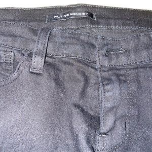 Flying monkey Black jeans with no rips. Great jeans and comfortable.
